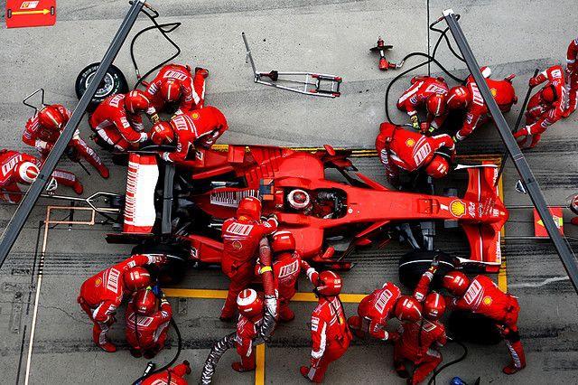 The Ferrari team working on a pit stop